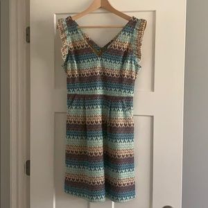 Mini Tabitha dress color is brown and blue